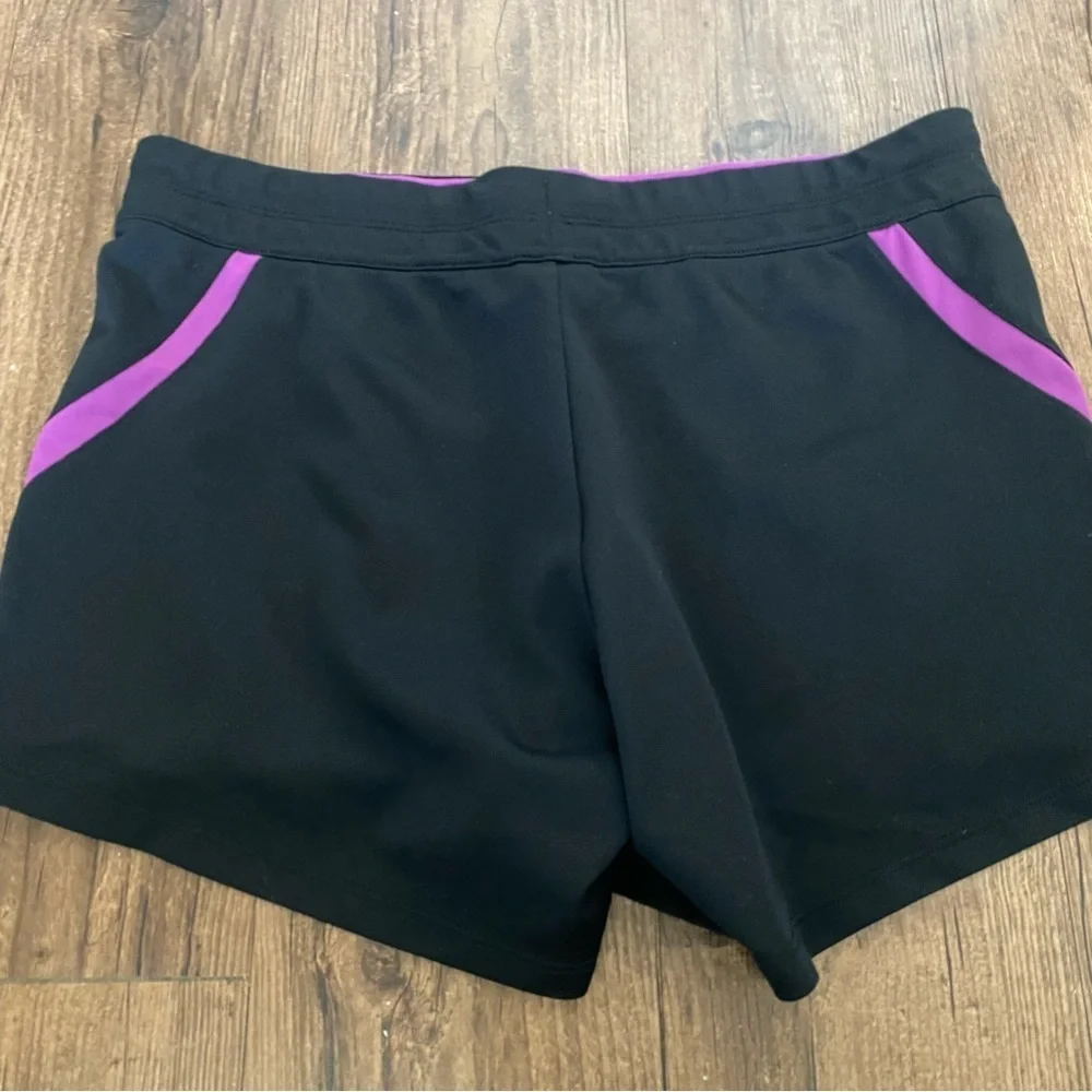 Nike Women's Black Shorts with Purple Accents